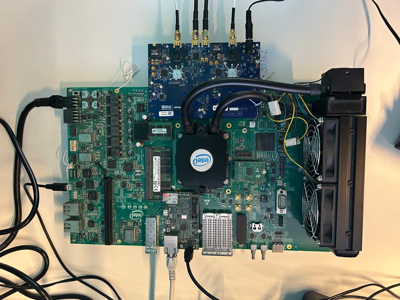 Image of Intel Stratix 10 SX SoC board with AD9213-DUAL-EBZ connected via FMC+