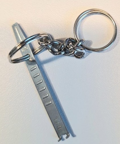 https://media.githubusercontent.com/media/analogdevicesinc/documentation/main/docs/solutions/reference-designs/ad-jupiter-ebz/images/cable_remover_key.jpg