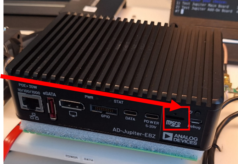 https://media.githubusercontent.com/media/analogdevicesinc/documentation/main/docs/solutions/reference-designs/ad-jupiter-ebz/images/sd_card_slot.png