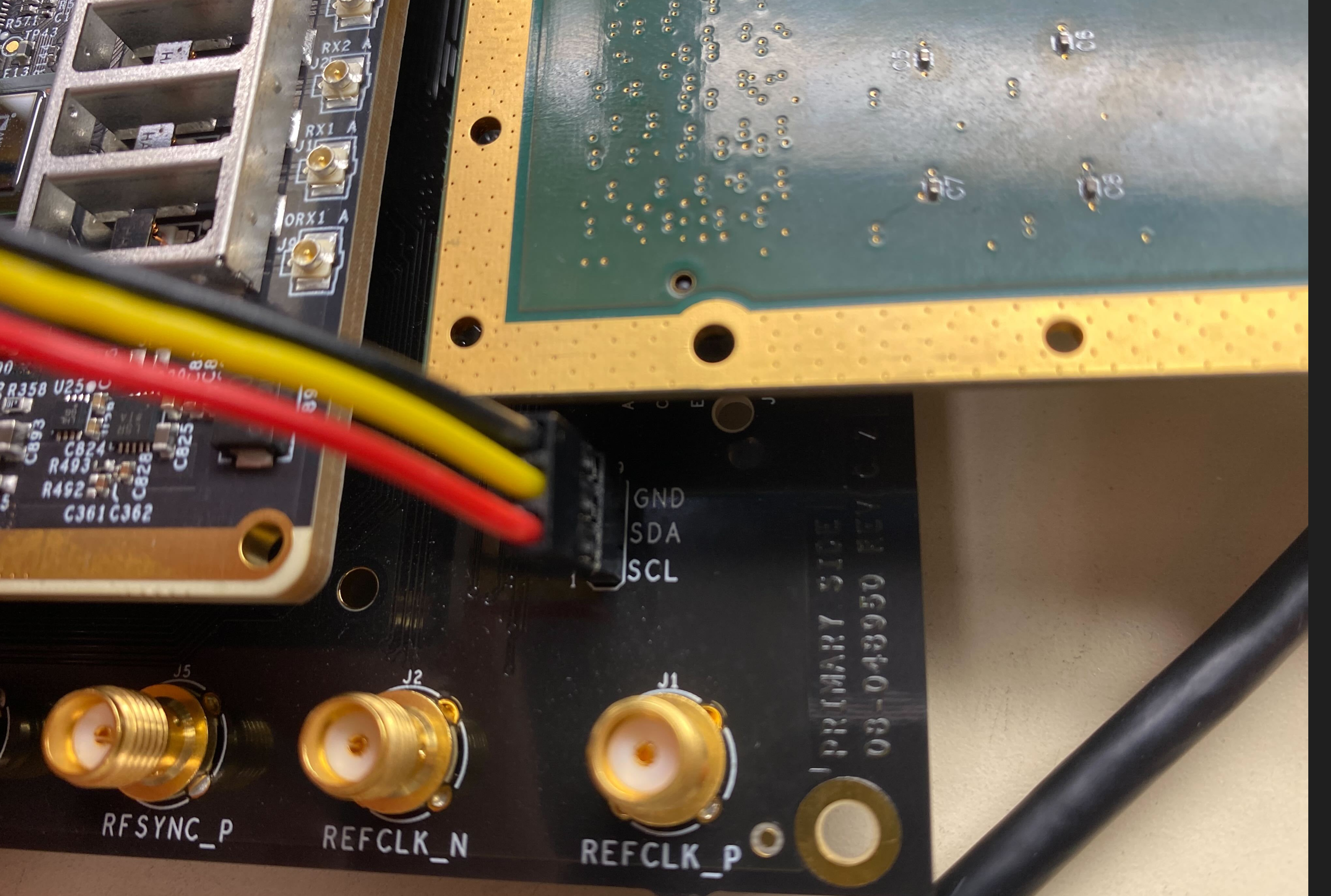 https://media.githubusercontent.com/media/analogdevicesinc/documentation/main/docs/solutions/reference-designs/eval-adrv9009/production-testing/images/i2c-rpi-adrv9009-conn.png