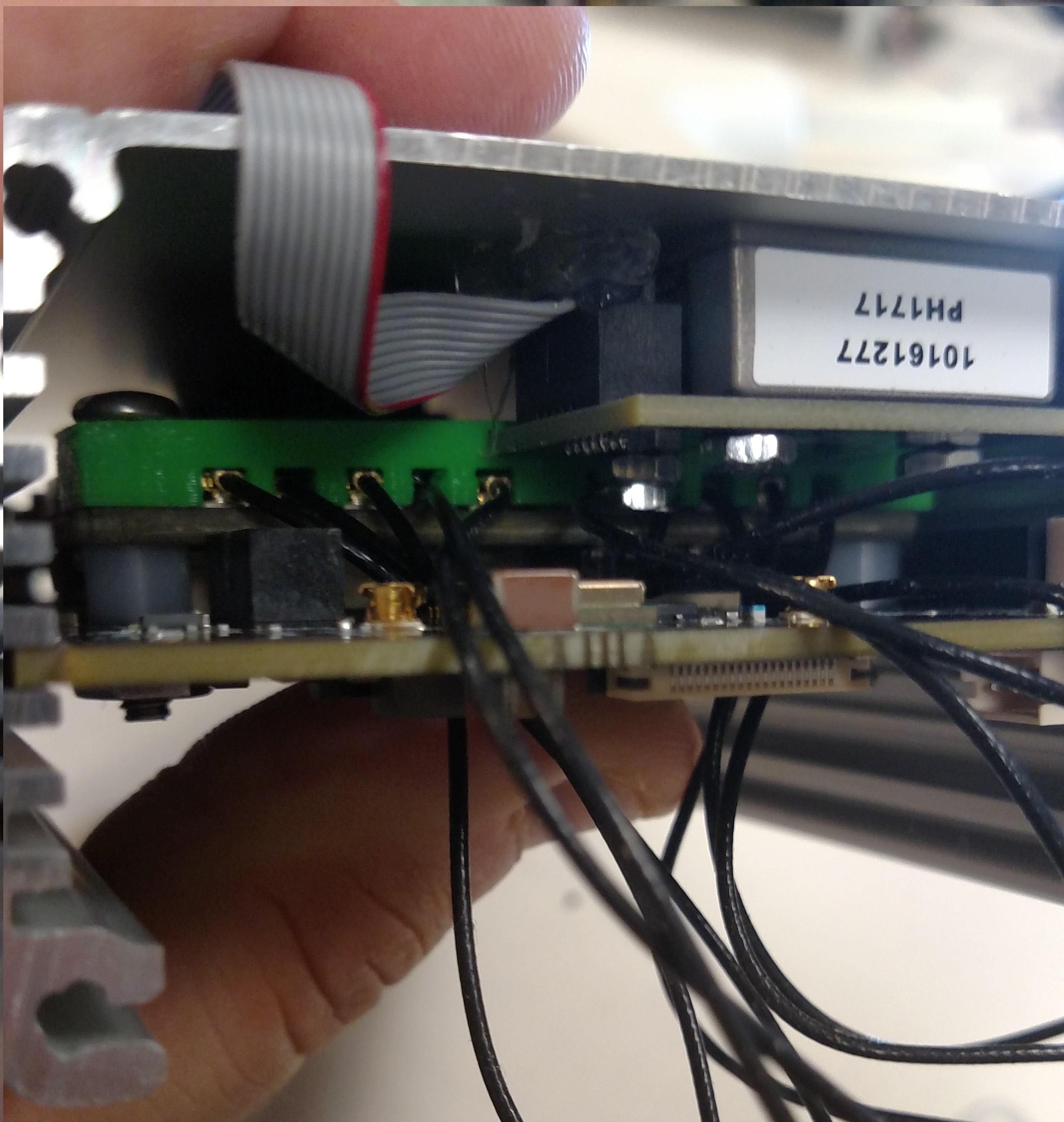 https://media.githubusercontent.com/media/analogdevicesinc/documentation/main/docs/solutions/reference-designs/pzsdr/images/back_view_of_cables_pcb_fp_-_alt.jpg