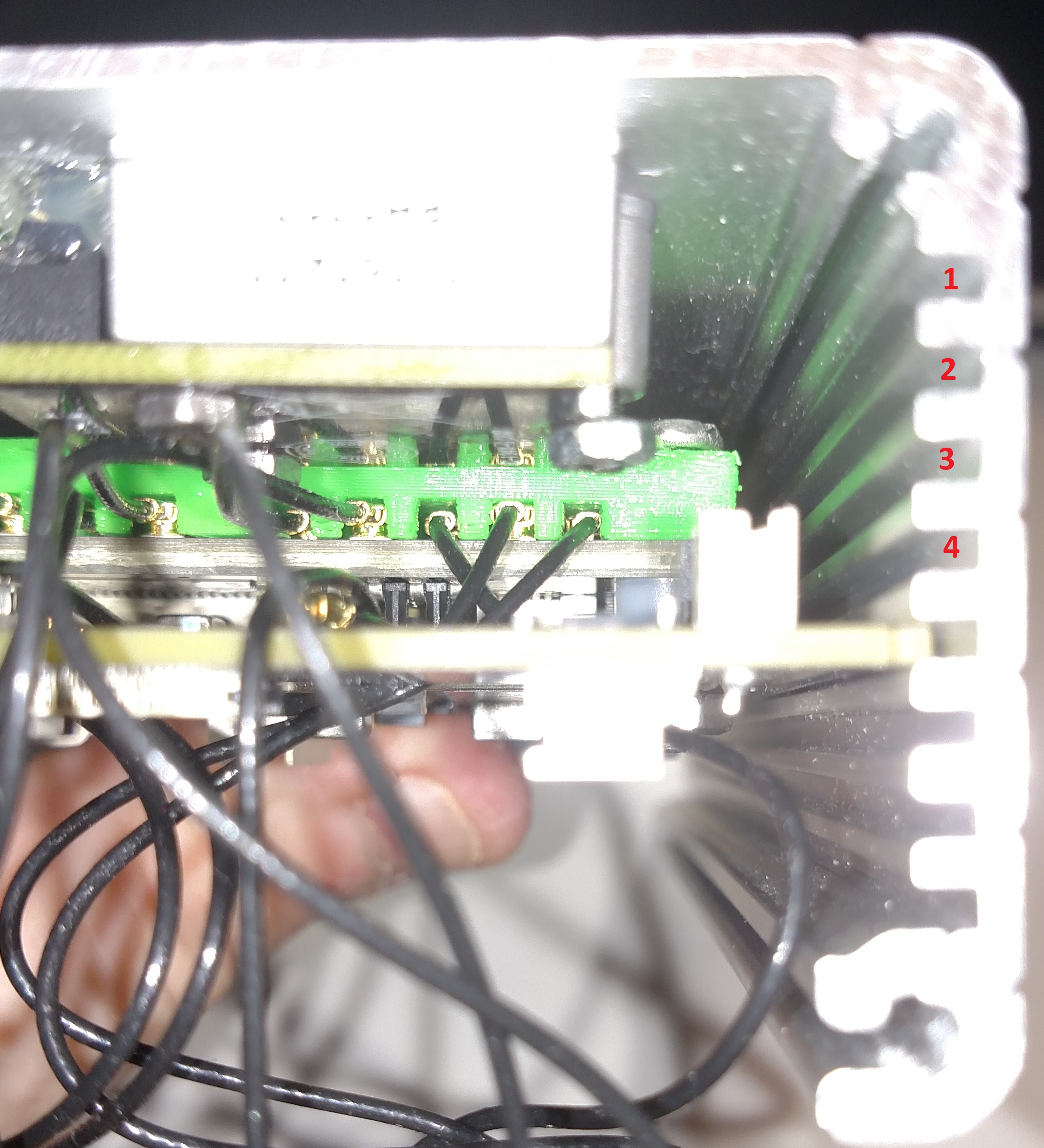 https://media.githubusercontent.com/media/analogdevicesinc/documentation/main/docs/solutions/reference-designs/pzsdr/images/case_saw_cut_for_jtag.jpg