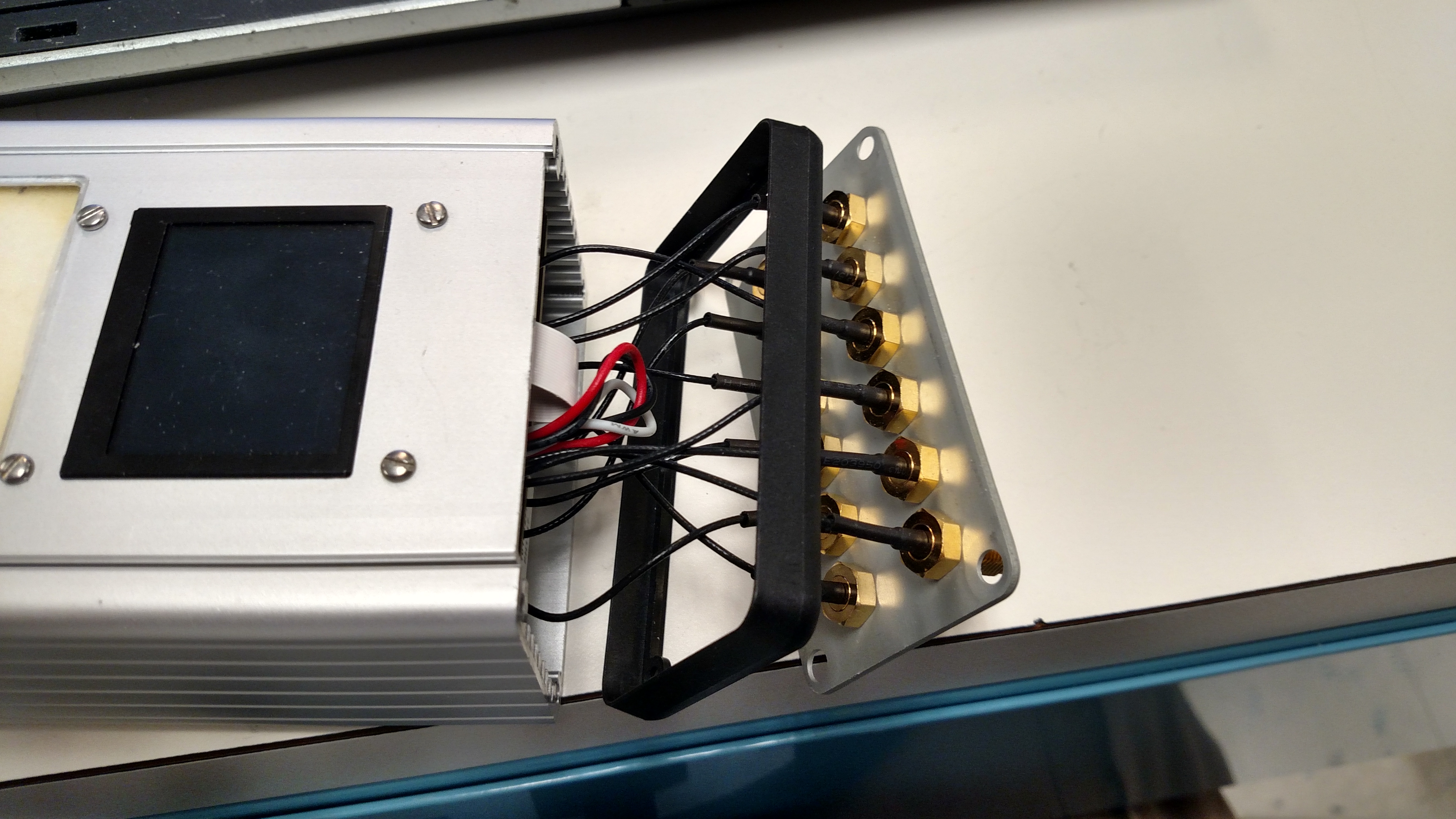 https://media.githubusercontent.com/media/analogdevicesinc/documentation/main/docs/solutions/reference-designs/pzsdr/images/second_step_in_applying_plastic_frame.jpg