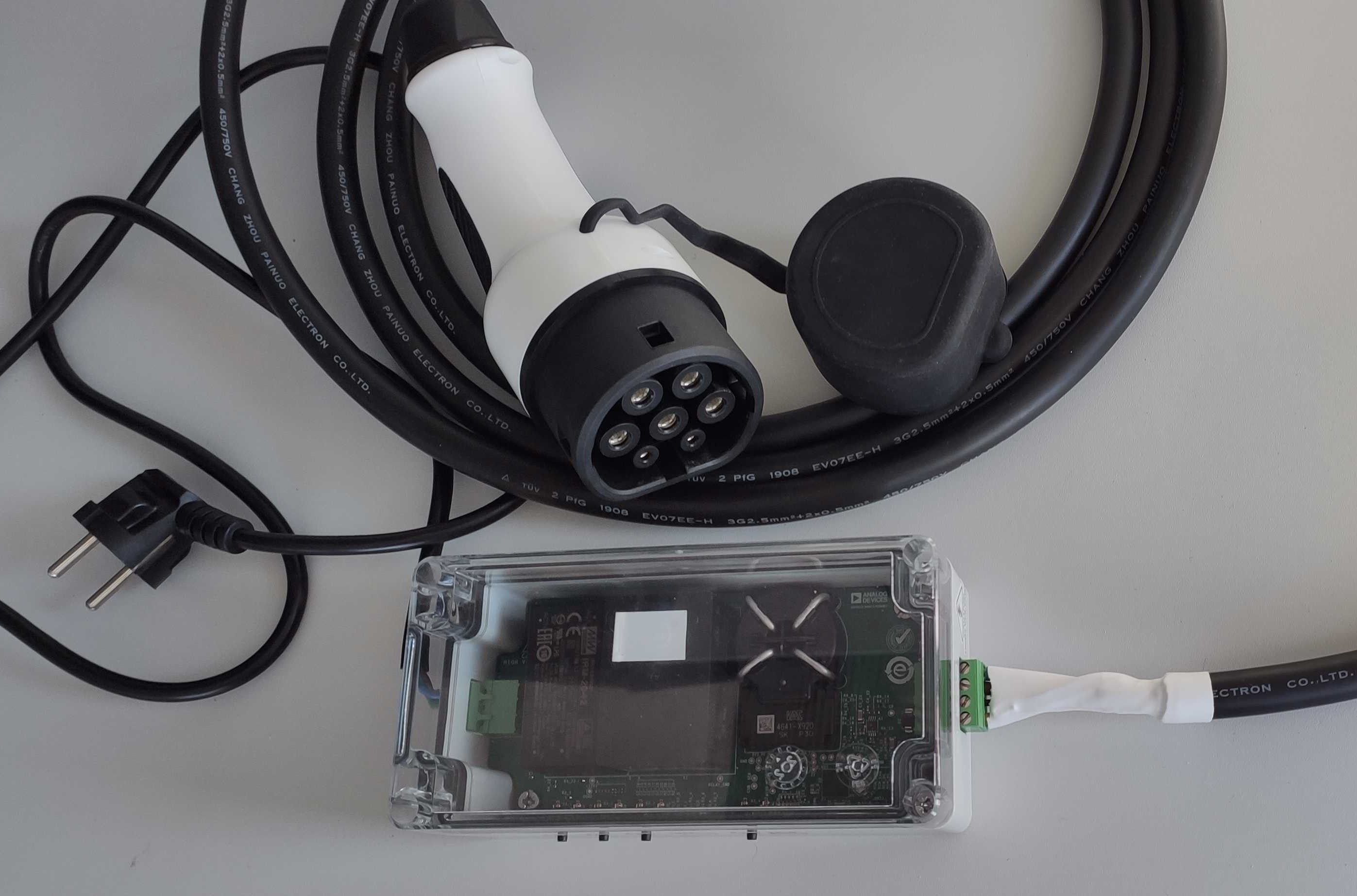 https://media.githubusercontent.com/media/analogdevicesinc/system-level/main/docs/solutions/reference-designs/ad-acevsecrdset-sl/hardware-guide/21_ad_acevsecrdset_sl_test_bench_type2_cable.jpg