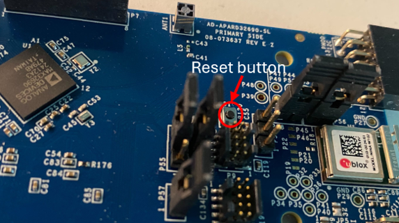 https://media.githubusercontent.com/media/analogdevicesinc/system-level/main/docs/solutions/reference-designs/ad-apard32690-sl/production_testing/images/reset_button.png