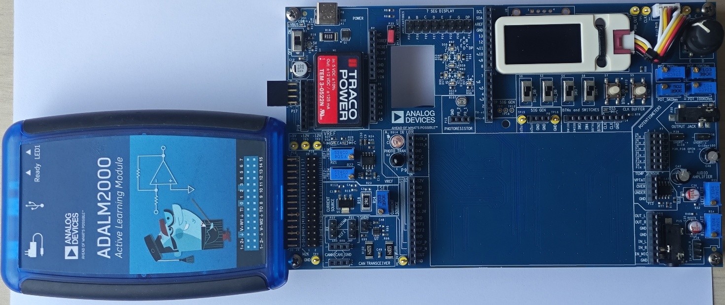 https://media.githubusercontent.com/media/analogdevicesinc/system-level/main/docs/solutions/reference-designs/ad-m2kcompedu-ebz/hardware-guide/images/adalm_plugin.jpg