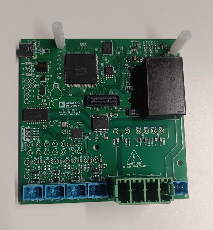 https://media.githubusercontent.com/media/analogdevicesinc/system-level/main/docs/solutions/reference-designs/ad-pqmon-sl/production_testing/images/main_board_fasteners_attached.jpg