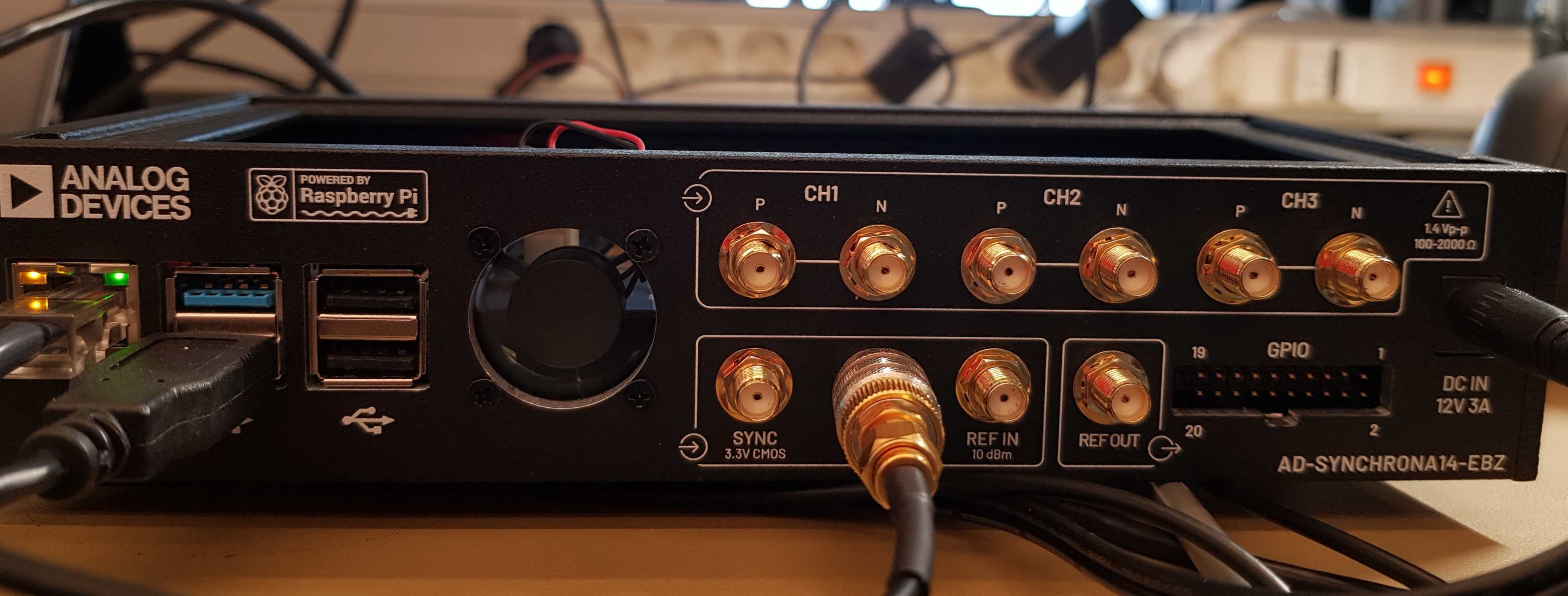 https://media.githubusercontent.com/media/analogdevicesinc/system-level/main/docs/solutions/reference-designs/ad-synchrona14-ebz/production_testing/images/backpanel.jpg