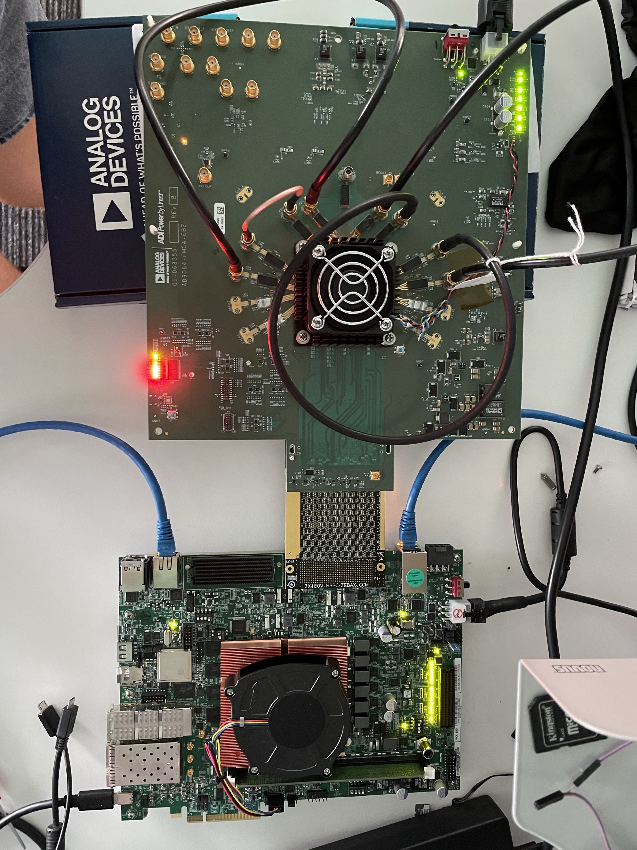 https://media.githubusercontent.com/media/analogdevicesinc/system-level/main/docs/solutions/reference-designs/ad9084_ebz/quickstart/versal/vck190_ad9084_ebz.jpg