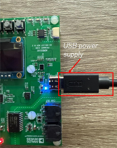 https://media.githubusercontent.com/media/analogdevicesinc/system-level/main/docs/solutions/reference-designs/adrd5161-01z/production_testing/images/usb_power_supply_connection.png