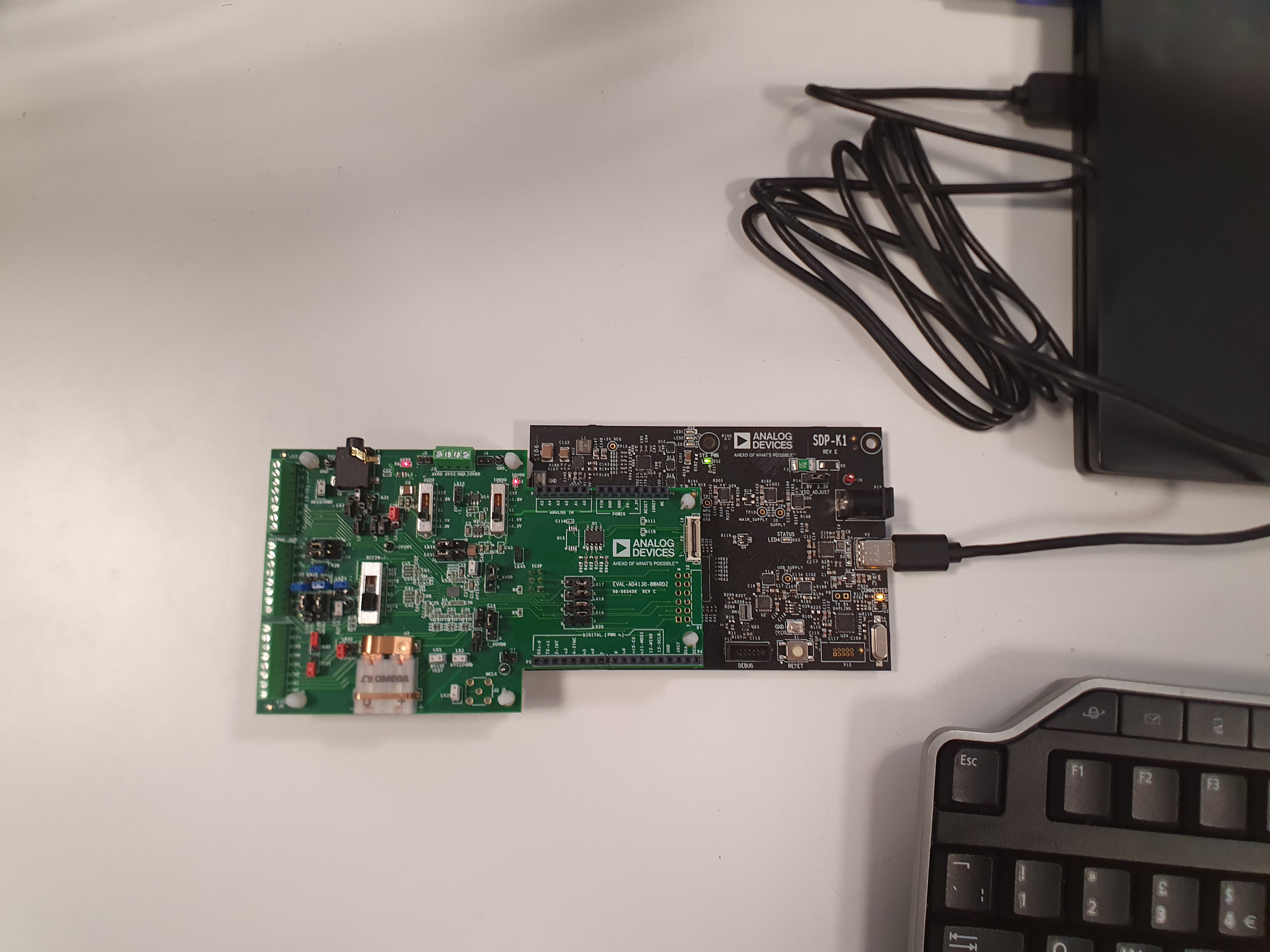 https://media.githubusercontent.com/media/analogdevicesinc/system-level/main/docs/solutions/reference-designs/eval-ad719x/ad4130-8/images/20220308_110921.jpg