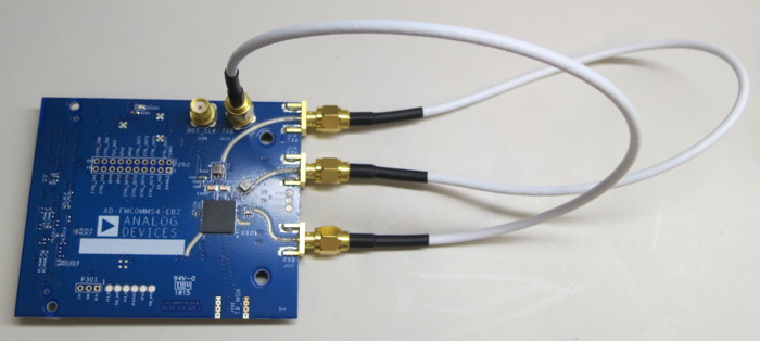 https://media.githubusercontent.com/media/analogdevicesinc/system-level/main/docs/solutions/reference-designs/fmcomms2/images/fmcomms4-loopback.jpg