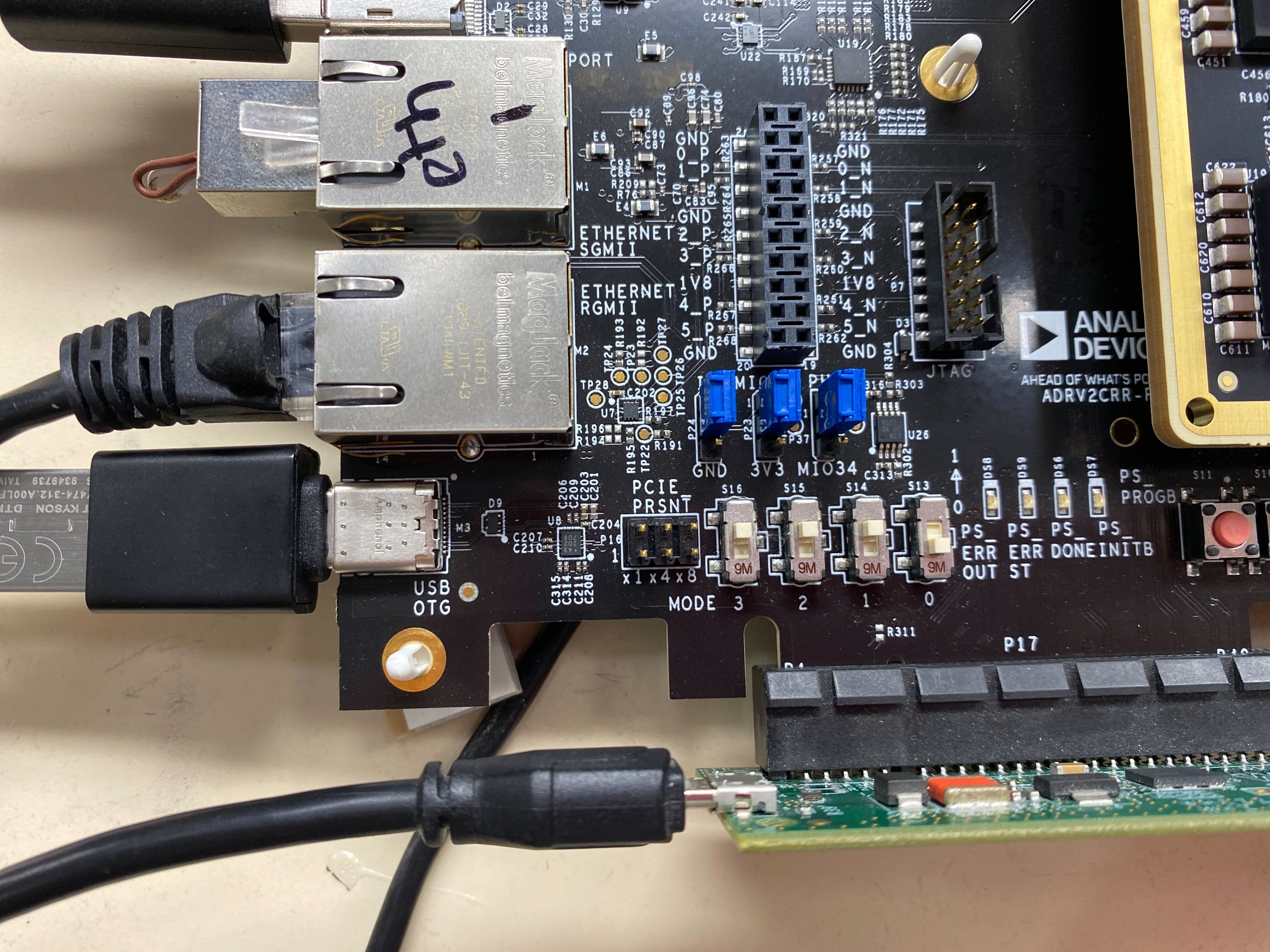 https://media.githubusercontent.com/media/analogdevicesinc/system-level/wiki_migration/adrv9009zu11eg_landing/docs/solutions/reference-designs/adrv9009-zu11eg/images/talise_t1_led_off.jpg