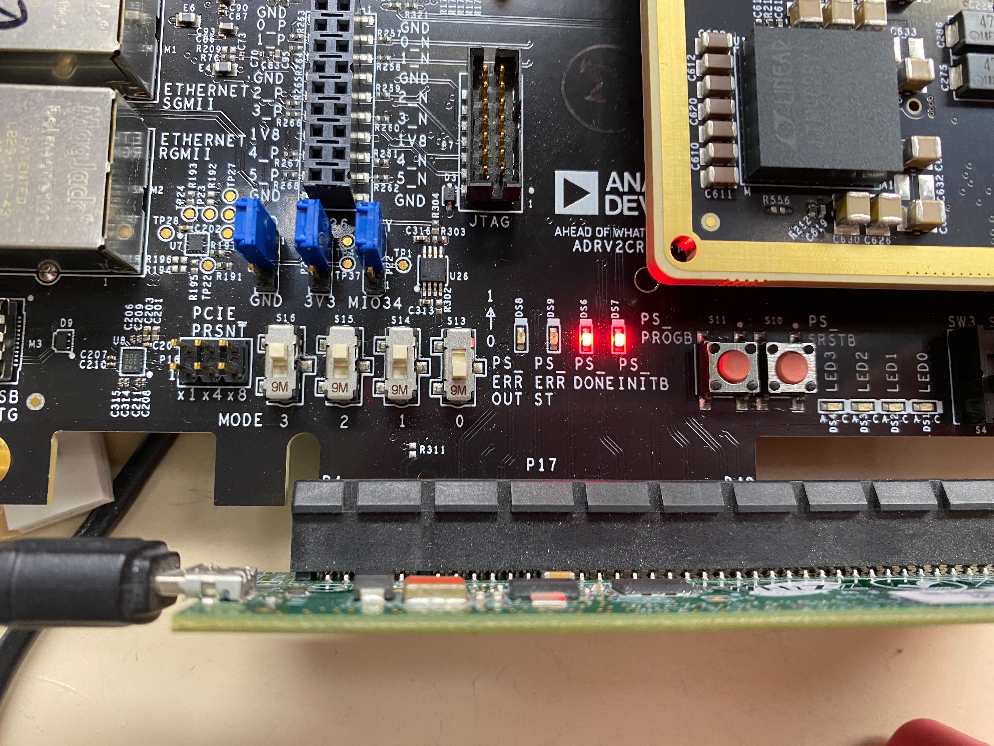 https://media.githubusercontent.com/media/analogdevicesinc/system-level/wiki_migration/adrv9009zu11eg_landing/docs/solutions/reference-designs/adrv9009-zu11eg/images/talise_t1_led_on.jpg